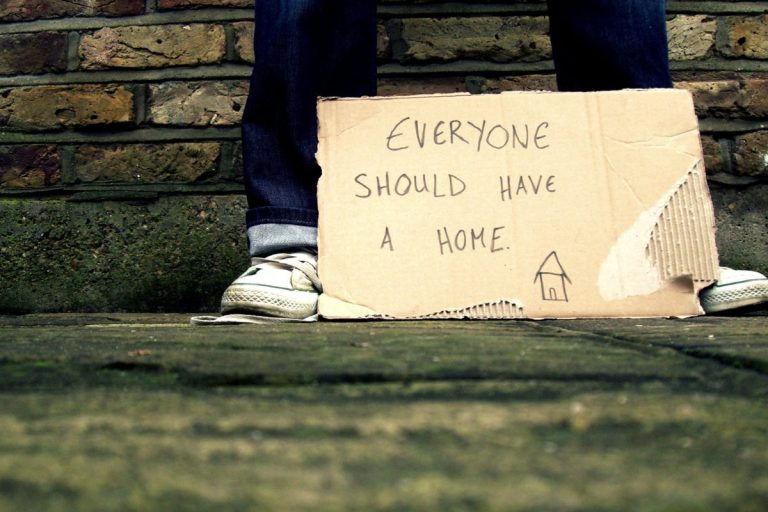 A piece of cardboard that reads