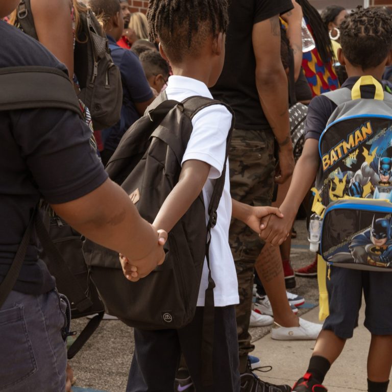 Photo of children walking into school by Caroline Gutman for Chalkbeat Philadelphia