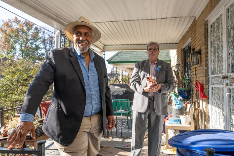Maurice Sampson (left) and Michael Kleiner (right), elected Democratic committeepeople in the 22nd Ward’s 6th Division, knock on every door to stop and speak with neighbor.