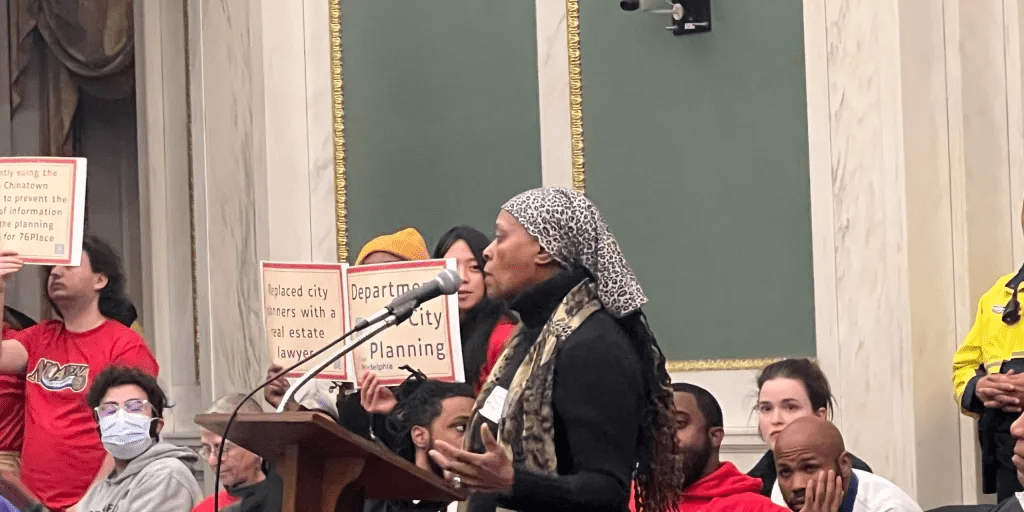 Photo of Celia Bernhardt giving public comment.