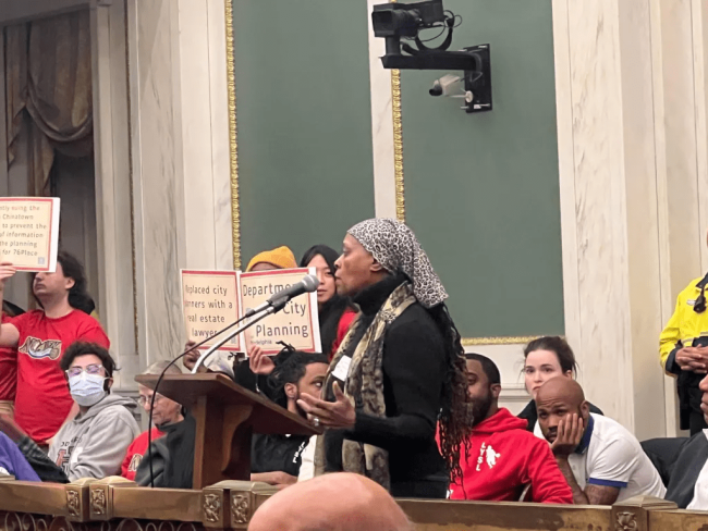 Photo of Celia Bernhardt giving public comment.