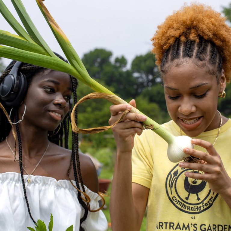 Hawa Kamara and Ain Dantzler, youth workers at Bartram's Garden, Sankofa Community Farm. Photo by Azella Gardens