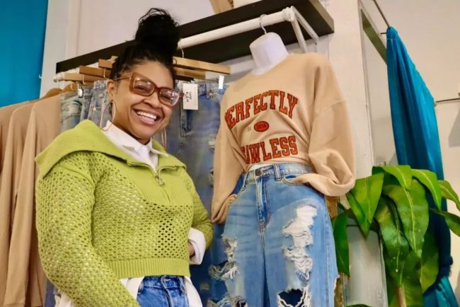 Crystal Jackson poses inside her boutique Perfectly Flawless in Germantown.