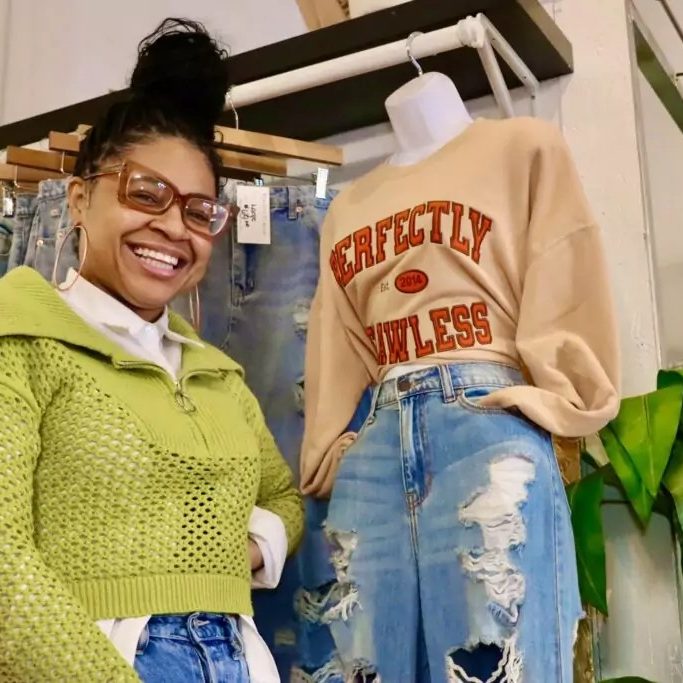 Crystal Jackson poses inside her boutique Perfectly Flawless in Germantown.