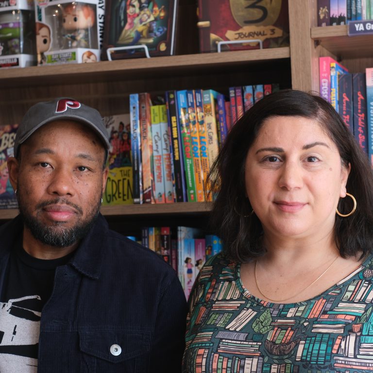 Gralin and Sara Zia Ebrahimi Hughes in their Chestnut Hill bookstore Multiverse, which specializes in comics, sci-fi, horror, and fantasy, or speculative fiction.